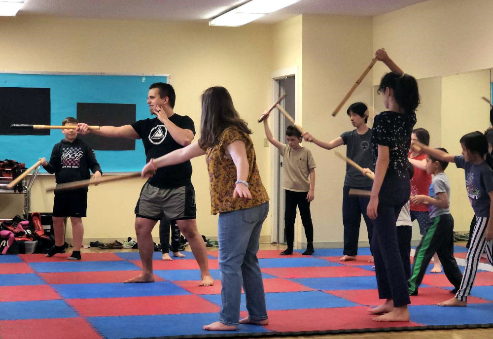 children practicing martial arts